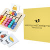 CVC Word Builder educational toy with letter blocks, word cards, and a Learning and Development Resources box for phonics and reading practice