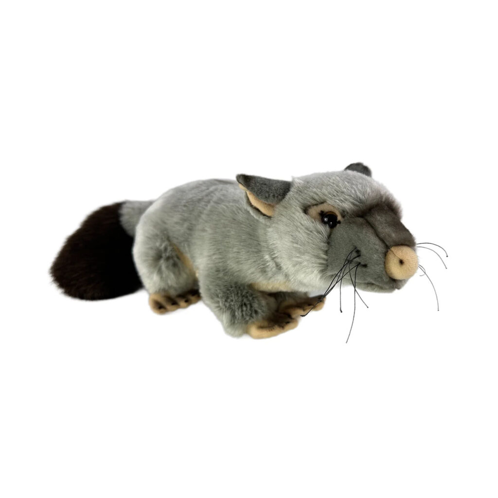 Plush toy of a common brushtail possum named Zack, handcrafted with soft grey fur, lifelike details, and a bushy tail. Eco-friendly design with recycled stuffing, laying on its belly.